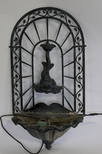 Antique Metal Wall Fountain with Dolphin Design.