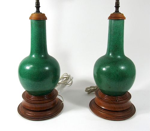Pair of Apple Green Bottle Vases Mounted as Lamps.