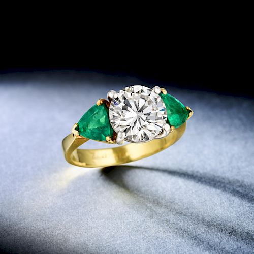 A 3.01-Carat Diamond and Emerald Ring