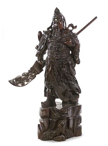 A Carved Zitan Wood Figure of Guan Gong, Height 41 3/8 inches.