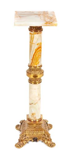 * An Onyx and Gilt Bronze Mounted Pedestal Height 38 inches.
