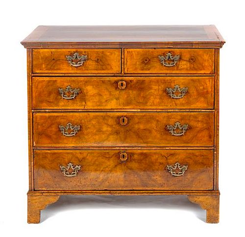 * A George II Walnut Chest of Drawers Height 36 1/2 x width 39 1/2 x depth 21 1/2 inches.