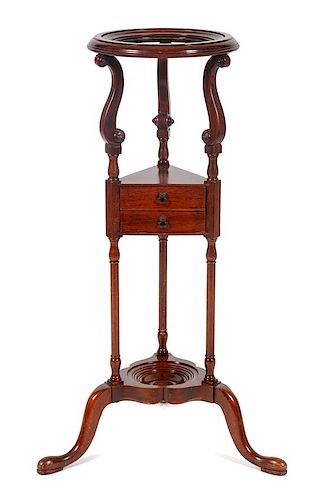 * A Georgian Style Mahogany Wig Stand Height 32 inches.