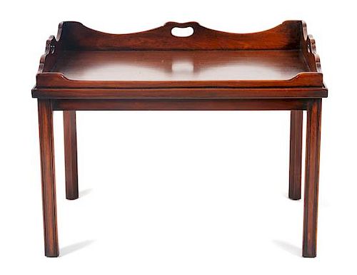 * A Georgian Style Mahogany Butler's Tray Table Height 19 3/4 x width 29 1/4 x depth 21 inches.