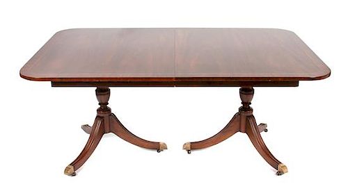 * A Regency Style Mahogany Extension Table Height 28 3/4 x width 80 x depth 46 inches.