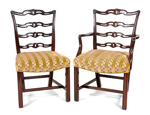 * A Set of Eight Chippendale Style Mahogany Dining Chairs Height 37 inches.