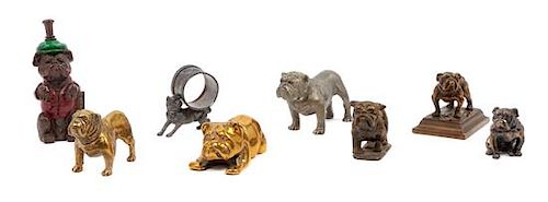 * A Group of Eight Bronze and Metal Bulldogs Height of tallest 5 1/4 inches.