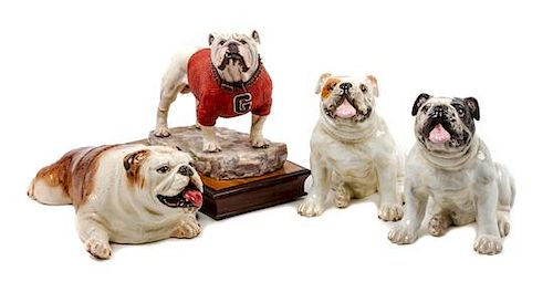* A Group of Four Bulldog Figures Width of widest 12 1/2 inches.