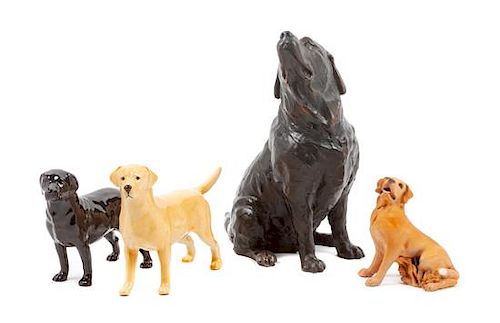 * A Group of Four Labrador Retriever Figures Height of tallest 10 1/2 inches.