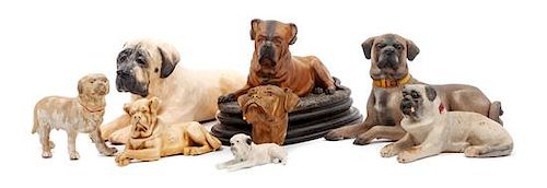 * A Group of Eight Mastiff Figures Width of widest 14 1/2 inches.
