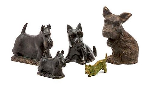 * Five Scottish Terrier Sculptures Height of tallest 7 3/4 inches.