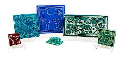 * Six Glazed Tiles depicting Stylized Dogs Width of widest 11 inches.