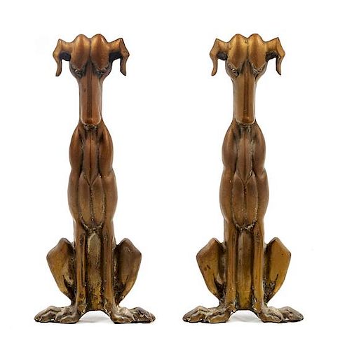 * A Pair of Bronze Andirons depicting Stylized Dogs Height 18 inches.