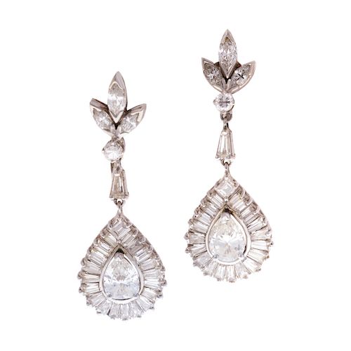 A Ladies Pair of Diamond Ear Pendants in Platinum