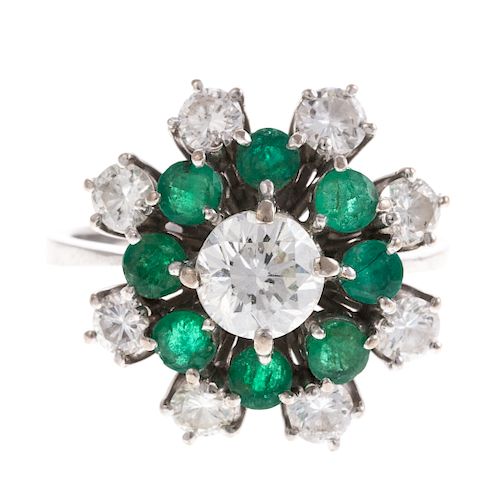A Ladies Diamond & Emerald Ring in Platinum