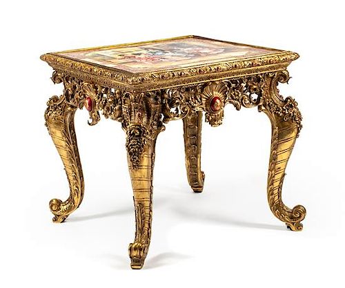 A Louis XV Style Gilt Bronze and Vienna Style Porcelain Table Height 29 x width 31 x depth 31 inches.