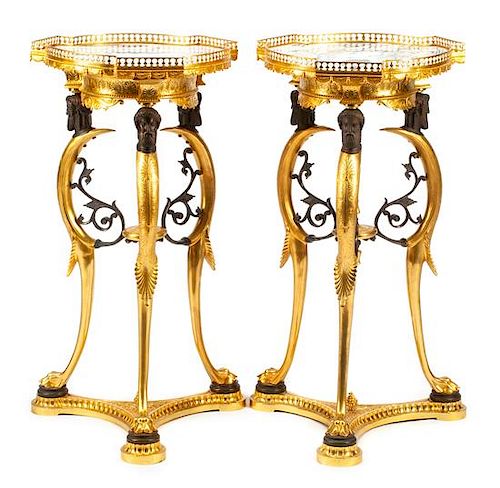 A Pair of Empire Style Gilt, Patinated Bronze and Marble Tables Height 32 x diameter of top 16 inches.