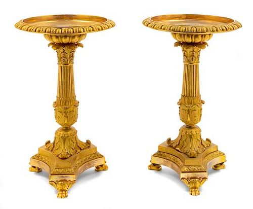 A Pair of Charles II Gilt Bronze Stands Height 12 3/8 x diameter 7 5/8 inches.