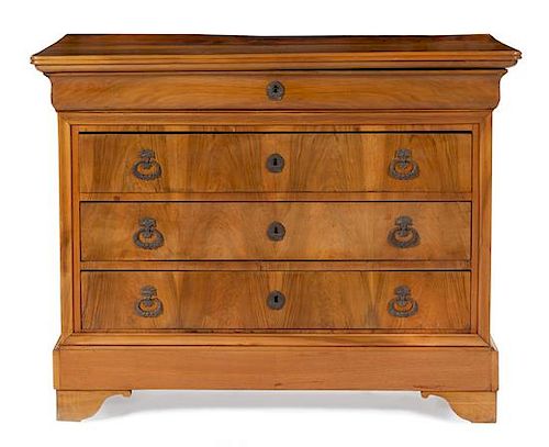 A Louis Philippe Walnut Commode Height 39 x width 51 x depth 22 inches.
