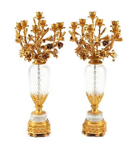 A Pair of French Gilt Bronze and Cut Glass Seven-Light Candelabra Height 33 inches.