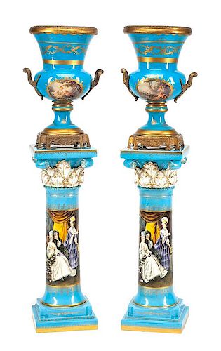 A Pair of Large Gilt Bronze Mounted Sevres Style Porcelain Urns with Pedestals Height of urn 24 1/2 inches; height of pedestal 3