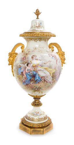 A Sevres Style Gilt Bronze Mounted Porcelain Urn Height 25 inches.