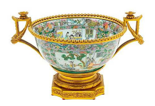 A Gilt Bronze Mounted Famille Verte Porcelain Punch Bowl Height 10 1/2 x width 17 1/2 inches.