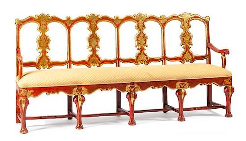 A Spanish Painted and Parcel Gilt Settee Height 42 x width 85 x depth 19 1/2 inches.