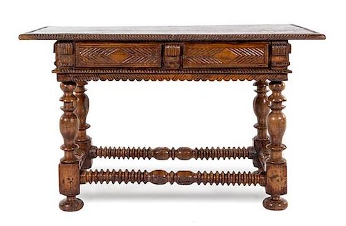 A Spanish or Portuguese Oak Table Height 32 x width 54 x depth 30 inches.