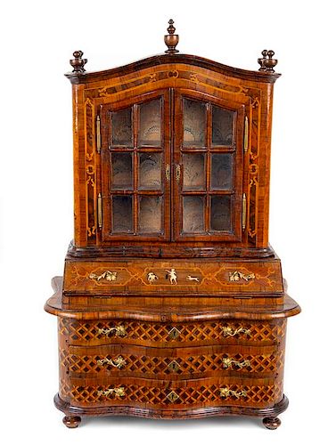 A Diminutive German Walnut and Marquetry Secretary Bookcase Height 23 3/8 x width 16 1/8 x depth 7 1/4 inches.