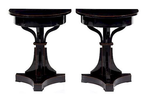 A Pair of Biedermeier Ebonized Pearwood Side Tables Height 30 1/4 x width 25 x depth 15 1/4 inches.