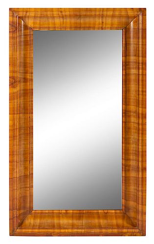 A Biedermeier Cherrywood Mirror Height 60 x width 38 inches.