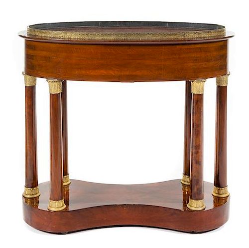 An Empire Style Gilt Bronze Mounted Mahogany Jardiniere Height 39 x width 42 x depth 21 inches.