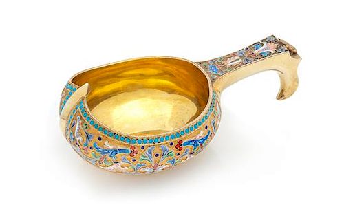 * A Large Russian Silver-Gilt and Enamel Presentation Kovsh, Mark of Ivan Saltykov, Moscow, 1896, the handle with an applied cre
