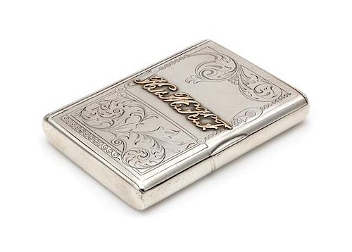 * A Russian Silver Cigarette Case, Mark of Ivan Khlebnikov with Imperial Warrant, Moscow, Late 19th/Early 20th Century, the lid