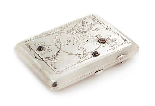 * A Russian Silver Cigarette Case, Joint-Stock Company of Moscow Goldsmiths AOAM3, Moscow, Early 20th Century, the lid with a ce