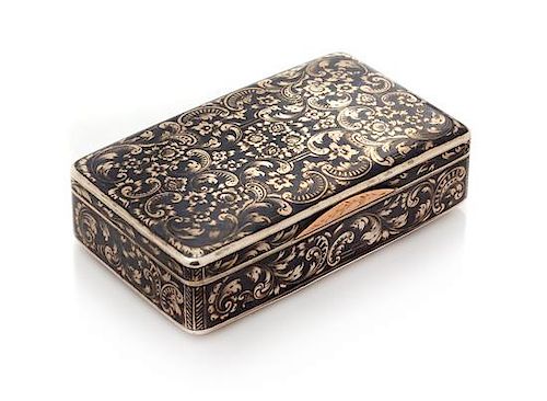 * A Russian Niello Silver Snuff Box, Mark of N. Motokhov, Moscow, 1853, the case worked to show floral and foliate scroll decora