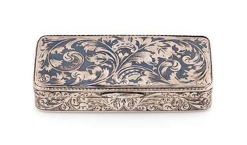* A Russian Silver and Niello Snuff Box, Maker's Mark Obscured, Moscow, 1857, the case worked to show foliate scrolls.