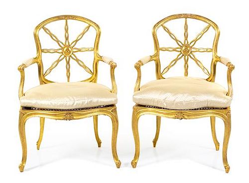 A Pair of George III Giltwood Armchairs Height 36 inches.