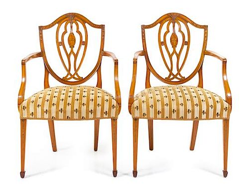 A Pair of George III Mahogany and Marquetry Armchairs Height 37 inches.