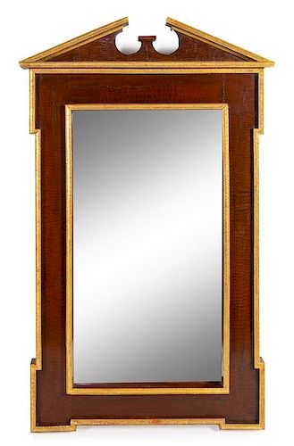 A George III Style Parcel Gilt Mahogany Mirror Height 58 x width 36 inches.