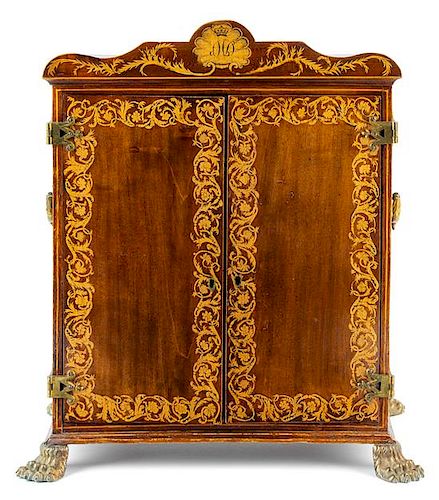 A Regency Marquetry and Mahogany Jewelry Cabinet Height 20 x width 17 3/4 x depth 11 3/4 inches.