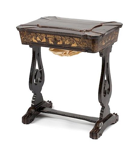 A Regency Chinoiserie Lacquered Sewing Table Height 26 x width 23 x depth 16 inches.