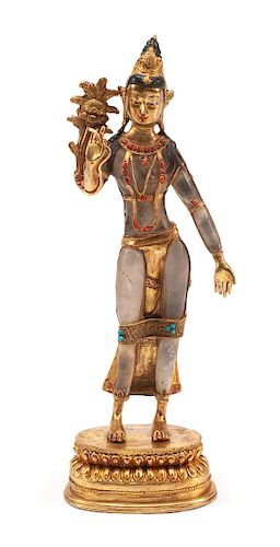 A Southeast Asian Jeweled Rock Crystal and Gilt Bronze Standing Deity Height 19 inches.