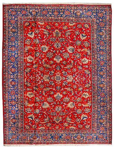 An Isfahan Wool Rug 13 feet 8 inches x 10 feet 4 inches.
