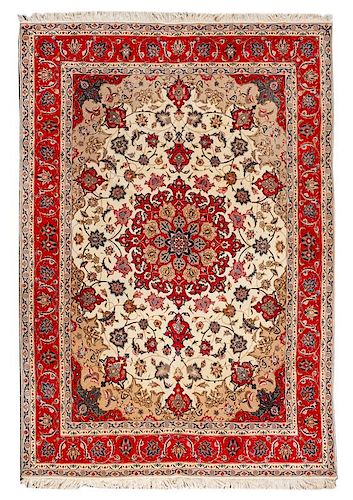 A Tabriz Wool and Silk Rug 7 feet 1 inch x 4 feet 10 1/2 inches.