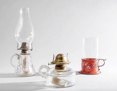 Two Pressed Glass Kerosene Lamps and a Red T?le Candle Holder with Glass Shade