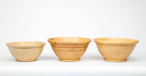 Three Yellowware Pottery Mixing Bowls