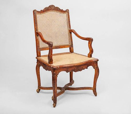R?gence Carved Beechwood and Caned Fauteuil ? la Reine