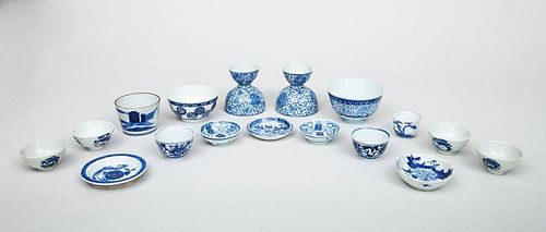Group of Eleven Modern Chinese Blue and White Bowls, Four Small Sauce Dishes, Pair of Egg Cups and a Cover